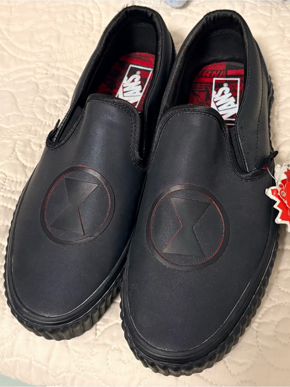 Vans Black Slip-On Loafers with Embossed Emblem